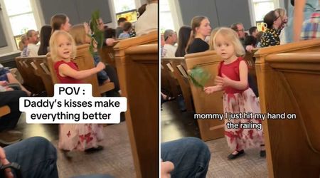 Daddy’s kisses prove to be the perfect remedy after little girl bumps her hand on the railing